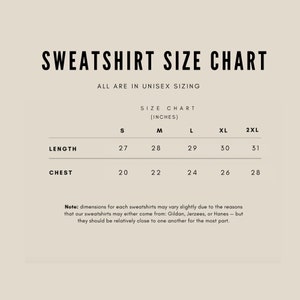 May include: A size chart for sweatshirts in unisex sizing. The chart shows the length and chest measurements in inches for sizes S, M, L, XL, and 2XL.