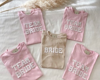 Chemises Team Bride | Chemises d’enterrement de vie de jeune fille | Chemises de fête de mariée | Chemises de douche nuptiale | Chemises de demoiselle d’honneur | Cadeau de proposition de demoiselle d’honneur