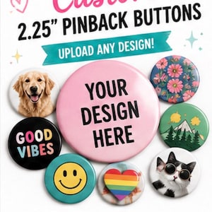 May include: A collection of round pinback buttons, including a large pink one with the text 'YOUR DESIGN HERE'. Other buttons feature a golden retriever, a cat with sunglasses, a smiley face, a rainbow heart, a mountain landscape, and 'GOOD VIBES' text. The image includes the text 'Custom 2.25" PINBACK BUTTONS', 'UPLOAD ANY DESIGN!', 'FULL COLOR PRINTING', and 'HANDMADE WITH CARE'.