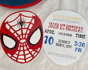 May include: A Spiderman-themed first birthday party invitation with red and blue colors. The invitation features a Spiderman logo, the text "Calling all superheroes", "Jacob 1st Birthday", "April 10", "Location", "Time", "123 Main St", "Miami FL, 12345", "3:30 PM", and "RSVP to Melissa: 305-305-305".
