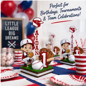 May include: A baseball-themed centerpiece featuring a cartoon player in a red and white uniform, a baseball, a glove, a bat, and a sign reading AIDAN with the number 1. The text Perfect for Birthdays, Tournaments & Team Celebrations is visible.