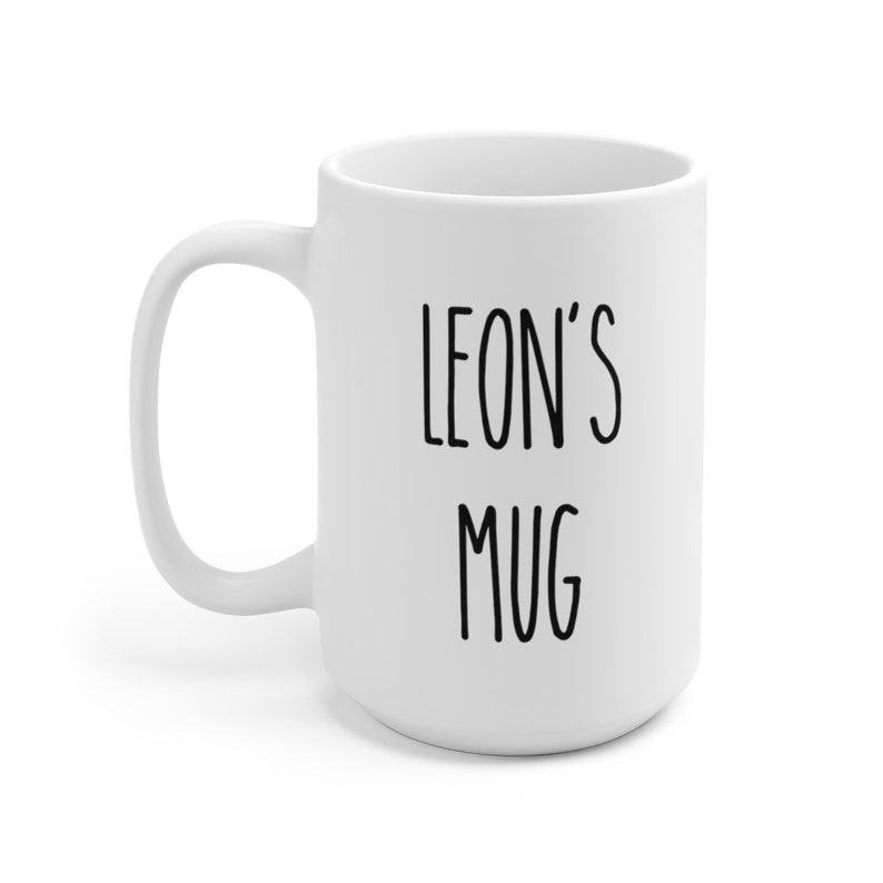May include: White ceramic mug with black text that reads "LEON'S MUG".