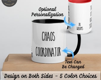 May include: White ceramic mug with a black rim and handle. The mug has the text "Chaos Coordinator" printed on the front. The mug is on a wooden surface. The text "Design on Both Sides - 5 Color Choices" is printed below the mug.