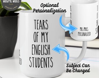May include: White ceramic 15 oz mug with black text that reads "Tears of my English Students". The mug has a handle and is shown on a white surface. The text "Subject Can Be Changed" is shown below the mug. The mug can be personalized with a name.