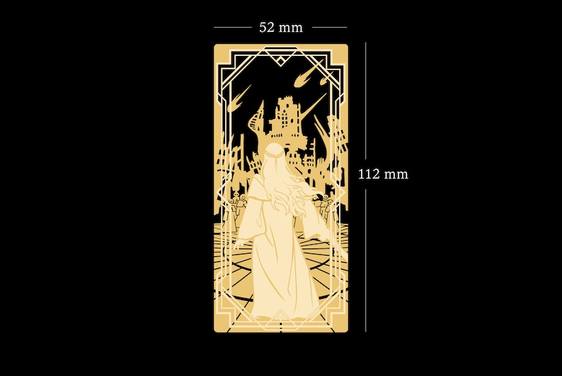 May include: A gold-colored metal bookmark with a detailed design of a woman in a long robe standing in a ruined city. The bookmark is 4.4 inches tall and 2 inches wide.