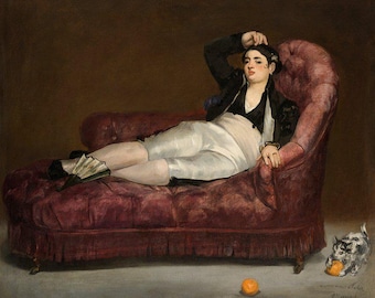 May include: A woman in a white and black outfit reclines on a burgundy chaise lounge with a fan in her hand. An orange sits on the floor in front of the chaise lounge.