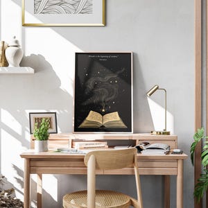 May include: A black and gold poster with a quote about wonder being the beginning of wisdom. The poster features an open book with golden pages and a swirling smoke design with stars.