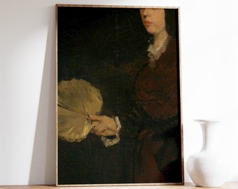 May include: A framed painting of a woman in a dark brown dress holding a large, pale yellow fan. The painting has a dark background and a distressed, aged look.