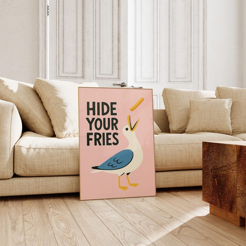 a picture of a bird on the floor next to a couch