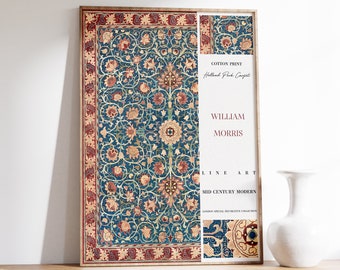 May include: A framed print of a vintage floral design with a blue background and red border. The print is titled "Holland Park Carpet" by William Morris. The print is part of the "Mid Century Modern" collection.