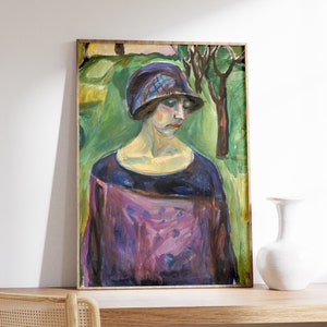 May include: A painting of a woman wearing a purple hat with a checkered pattern. She is wearing a purple dress with a black collar and is standing in a green field with trees in the background.