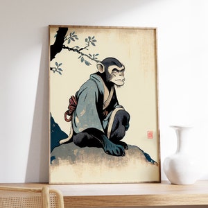 May include: A vintage-style print of a monkey wearing a blue robe with a red sash, sitting on a rock with a tree branch behind it.