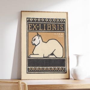 May include: A vintage style "Ex-Libris" bookplate featuring a white cat with black eyes and a black border. The text "A.J.D.G. 1916" is in the upper right corner.