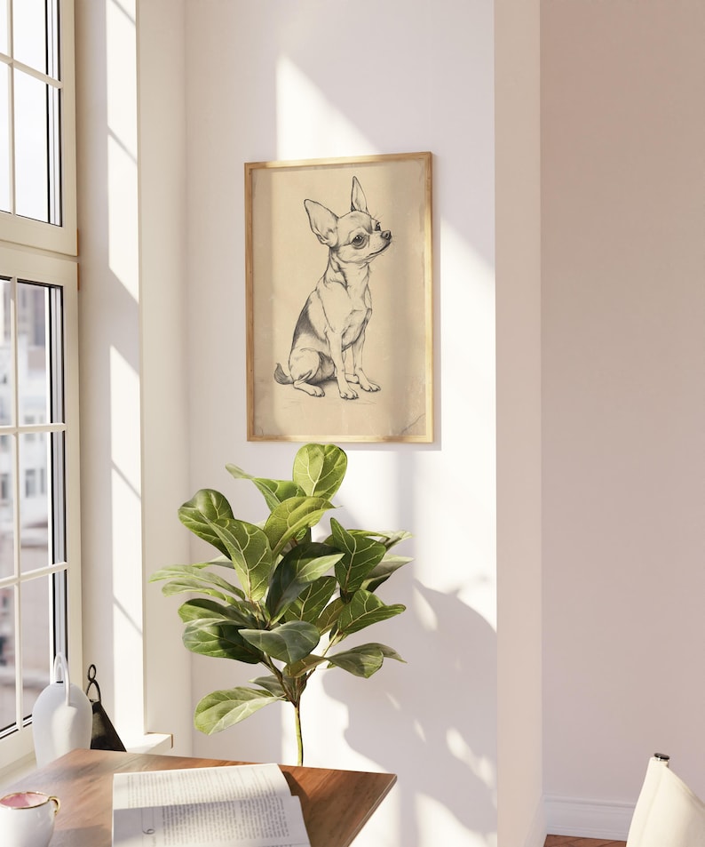 a small dog is hanging on the wall above a table