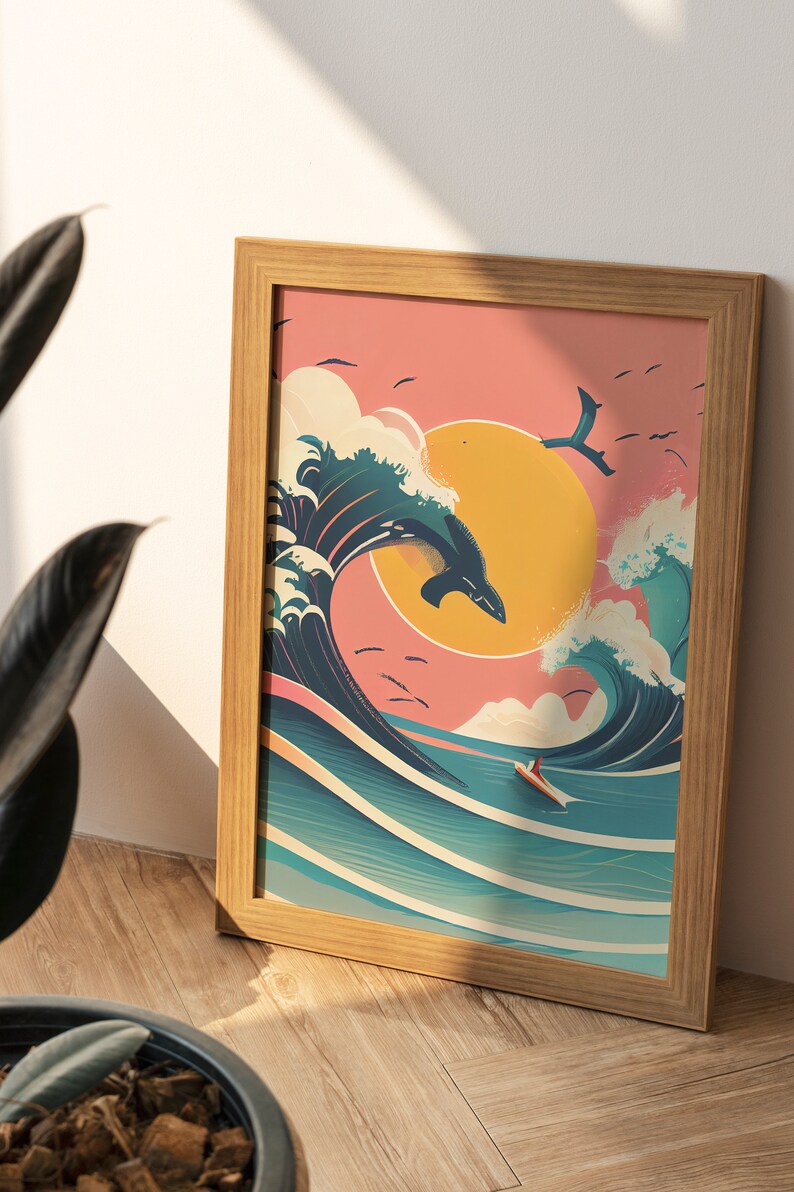 May include: A framed print of a whale jumping over a large wave with a sunset in the background. The wave is blue and green, and the sunset is pink and orange. There is a small boat in the water below the wave.
