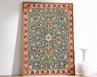 May include: A framed print of a vintage rug with a blue background and intricate floral patterns in shades of red, orange, and yellow.