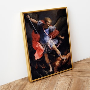 May include: A framed painting depicting a winged angel with a sword, standing over a fallen figure. The angel is wearing a blue tunic and red cape, and the fallen figure is lying on the ground. The painting is set against a dark background.
