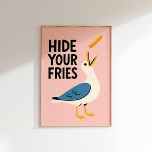 a picture of a bird hanging on a wall
