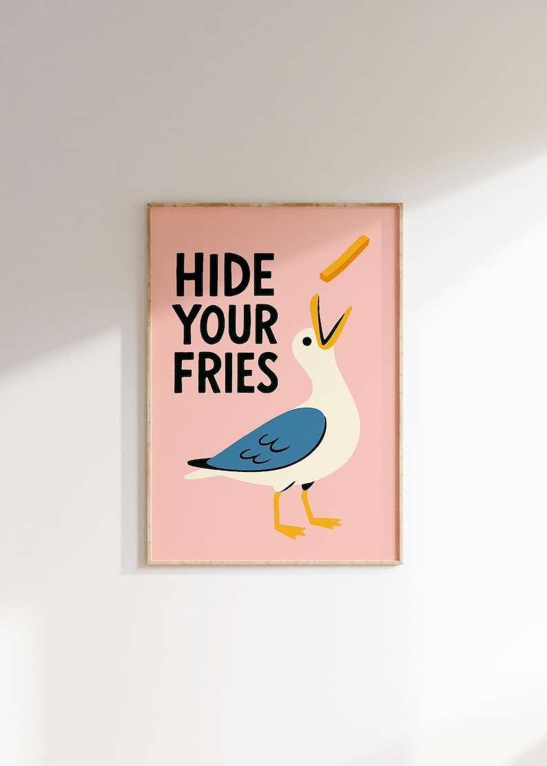 a picture of a bird hanging on a wall