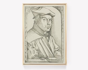 May include: A black and white engraving of a man wearing a hat and a robe. He is looking to the right and holding a book in his left hand. The engraving is framed in a gold frame.