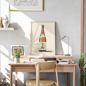 a desk with a chair and a picture on the wall