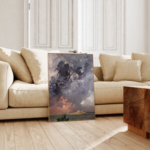 a picture of a painting on the floor of a living room