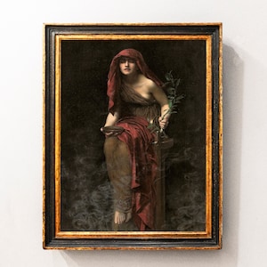 May include: Framed artwork depicting a woman in a red head covering and draped clothing, holding a bowl and a sprig of leaves. The painting has a dark background and is in a gold and black frame.
