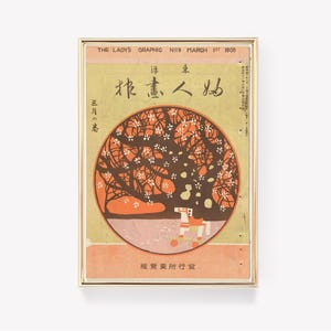 May include: A vintage magazine cover featuring a Japanese illustration of a tree with pink blossoms and a rocking horse. The cover text reads "THE LADY'S GRAPHIC N№9 MARCH 1ST 1908" and "作畫人物".