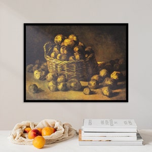 May include: A painting of a still life with a basket of potatoes. The potatoes are arranged in a basket and spilling out onto a table. The background is a dark brown color.