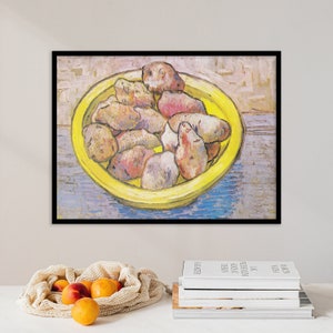 May include: A painting of a yellow bowl filled with potatoes. The potatoes are various shades of brown, yellow, and purple. The bowl is on a blue and white patterned surface.