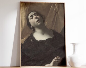Könnte beinhalten: Ein gerahmtes Gemälde einer Frau mit dunklen Haaren und einem schwarzen Kleid, die mit geschlossenen Augen daliegt. Der Hintergrund ist in einem gedämpften Braun mit einem Hauch von Gold gehalten.