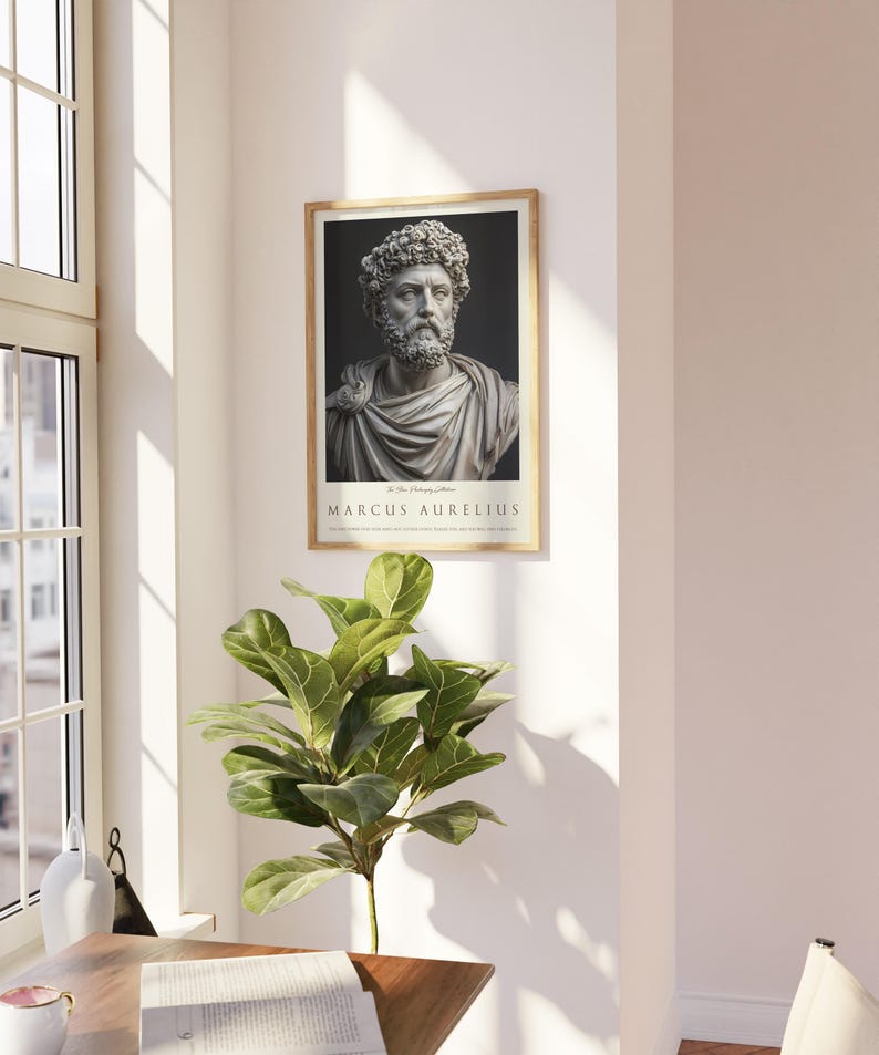 May include: A framed poster with a black and white image of a bust of Marcus Aurelius. The text "To The Memory of" and "Marcus Aurelius" are printed below the image.