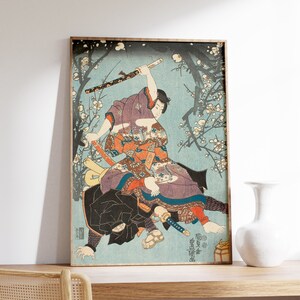 May include: A vintage Japanese woodblock print depicting a samurai in a purple and red robe fighting a ninja in black. The scene is set against a blue background with white cherry blossoms.