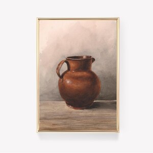 May include: A watercolor painting of a brown ceramic pitcher with a wide mouth and a handle. The pitcher is sitting on a wooden table against a light pink background.
