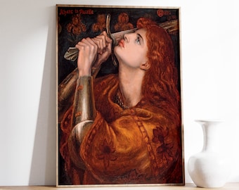May include: A painting of a woman holding a sword, titled "Jehane la Pucelle" with the year "1882" in the upper right corner. The woman is wearing a brown and gold robe with a floral pattern. She has long red hair and is looking up at the sword.