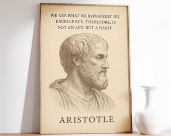 May include: A framed print featuring a sepia-toned illustration of Aristotle, with the text "WE ARE WHAT WE REPEATEDLY DO. EXCELLENCE, THEREFORE, IS NOT AN ACT, BUT A HABIT. ARISTOTLE." The print is displayed on a wooden surface.