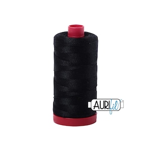 May include: A black spool of thread with a red base and top. The thread is tightly wound, and the spool has the Aurifil logo on the side. Ideal for sewing and quilting projects.