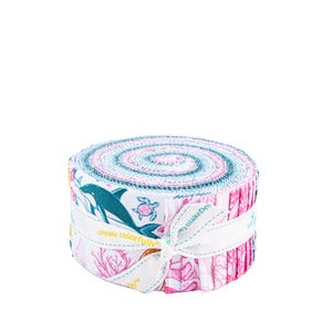 May include: A rolled bundle of fabric strips featuring a marine life theme. The fabric has a white background with illustrations of dolphins, turtles, and coral in shades of teal, pink, and white. A white ribbon with text wraps around the bundle.