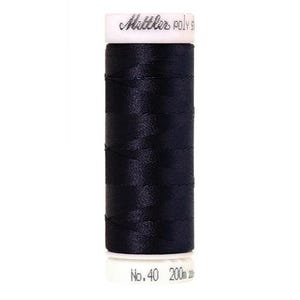 May include: A spool of dark blue thread with the text " Gütermann Poly Silk No. 40 200m 220yd" printed on the label.