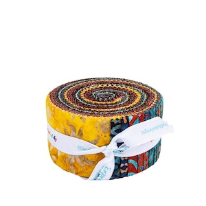 May include: A rolled bundle of colorful fabric strips, tied with a white ribbon. The fabric features a variety of patterns and colors, including yellow, blue, red, and brown. The ribbon has text that reads "Riley Blake Designs".