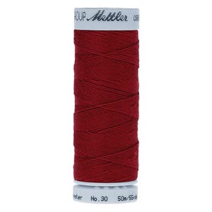 May include: A spool of red thread with the text "Mettler" on the label. The label also includes the text "No. 30" and "50m/55yds".