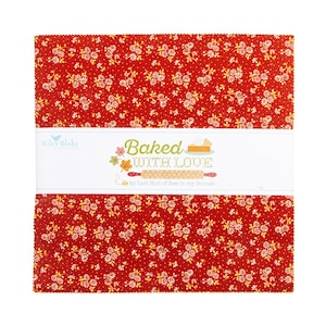 May include: A stack of square fabric pieces featuring a red background with a small white floral pattern. A white paper band wraps around the center, printed with the text Baked With Love, a rolling pin graphic, and Riley Blake Designs.