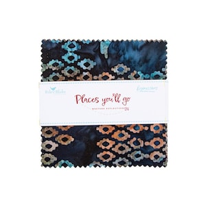 May include: A stack of fabric squares with a dark blue and teal pattern, featuring a repeating geometric design. The fabric is bound with a white label that reads "Places you'll go" and "Western Reflections."