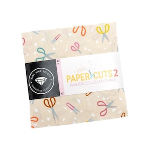 May include: A stack of 42 fabric squares, 5 inches each, from the Ruby Star Society. The fabric has a cream background with colorful scissors and triangle patterns. The package is labeled "PAPER CUTS 2" by Rashida Coleman Hale.