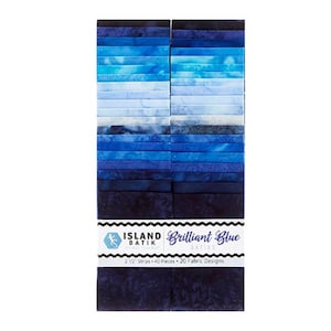May include: A pack of 20 fabric strips in shades of blue, from light to dark, with a label that reads "Island Batik Brilliant Blue Batiks 2 1/2" Strips - 40 Pieces - 20 Fabric Designs".