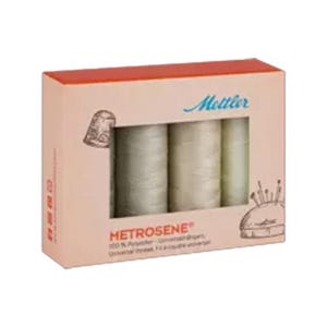 May include: A box of Metrosene thread, a 100% polyester general purpose thread. The box is orange and white with a picture of three spools of thread and a thimble.