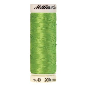 May include: A spool of green thread labeled "Mettler Poly" with "No. 40 200m 220yd" printed on the bottom.