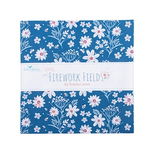 May include: A stack of fabric squares with a floral pattern. The fabric is a deep blue with white and red flowers and foliage. A white band across the middle reads "Firework Fields" by Gracey Larson.