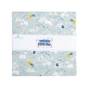 May include: A stack of fabric squares with a whimsical print featuring white sheep, yellow stars, and blue moons on a light green background. The fabric is labeled "twinkle little star" by Riley Blake Designs.