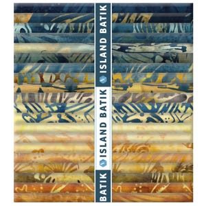 May include: A stack of fabric strips featuring a gradient of colors from deep navy blue at the top to warm orange and brown at the bottom. Each strip displays a unique batik pattern. A vertical band in the center reads ISLAND BATIK.